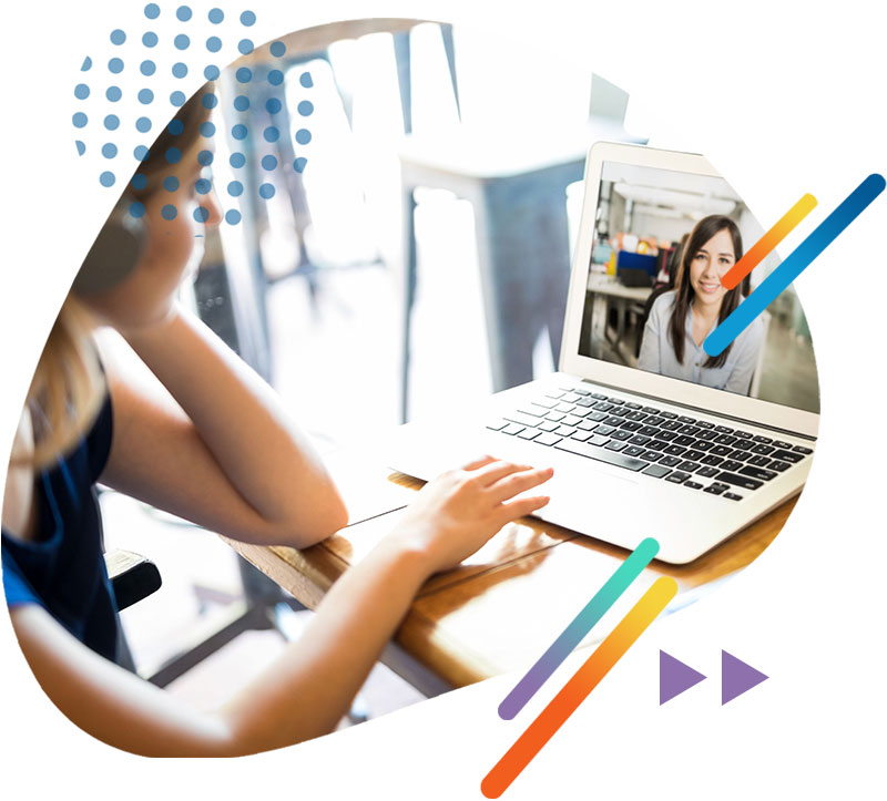 Lady watching webinar at desk