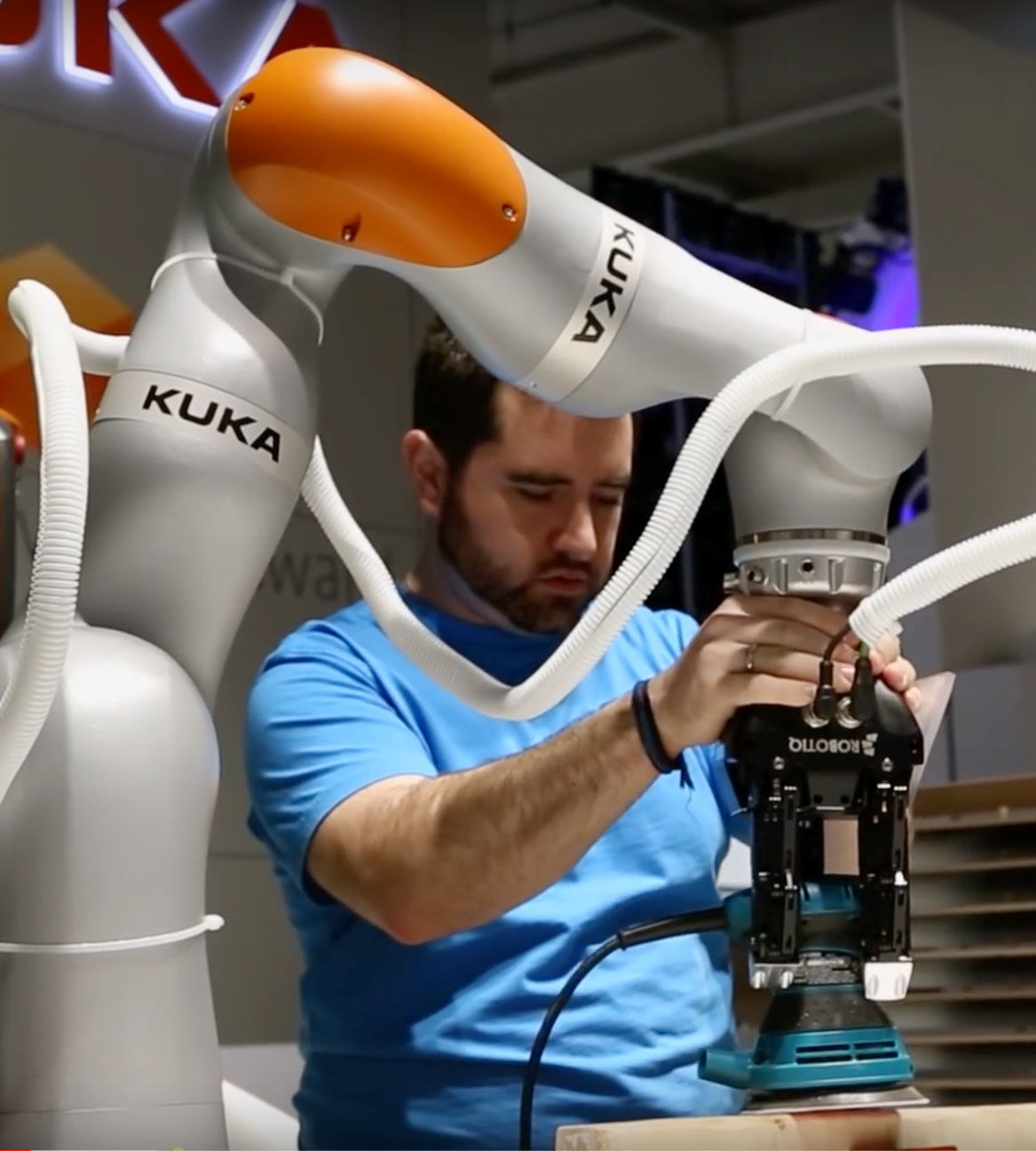 Man working on robotics machine
