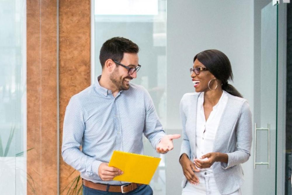 30 something man and woman chatting