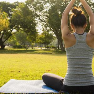 Lady doing yoga in park