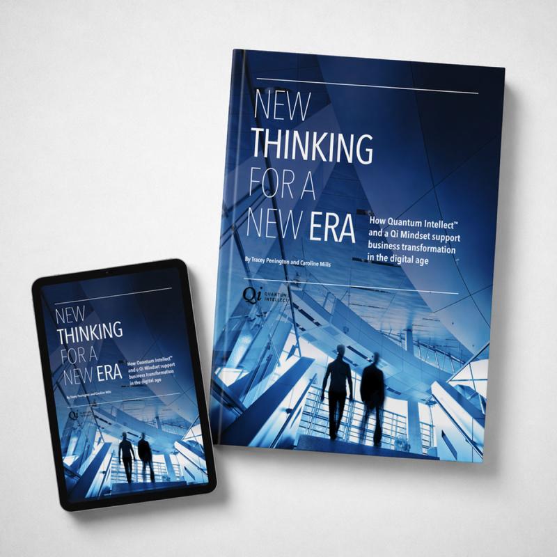 New Thinking for a New Era paperback book next to Kindle iPad version
