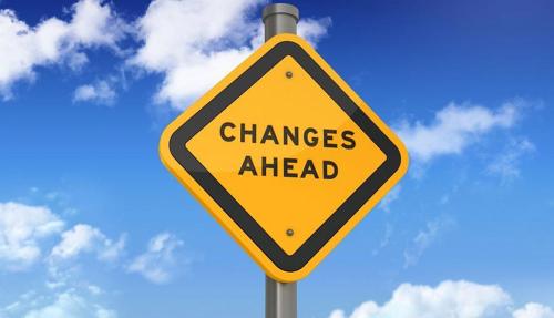 Yellow road sign with words Changes Ahead