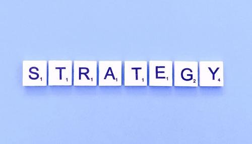 Scrabble tiles saying Change Strategy