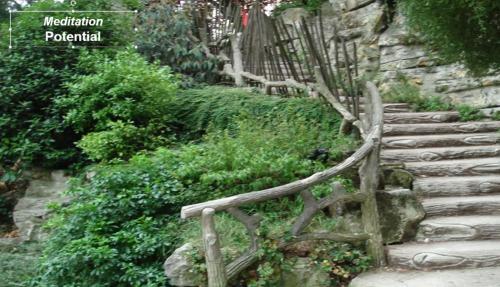 Stairs leading up green mountain