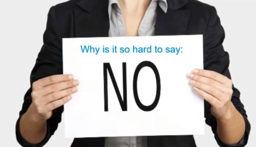 Lady with sign saying NO