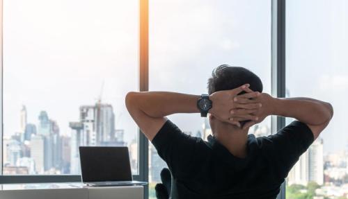 Man chilling at desk