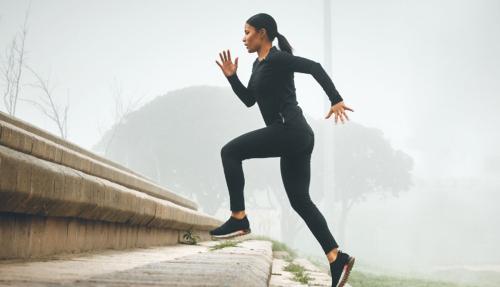Lady climbing steep hill