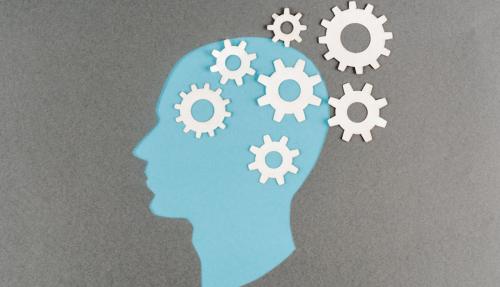 Illustration of head with cogs