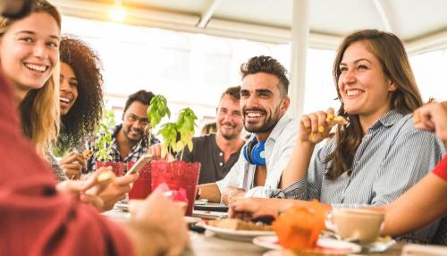 Group of friends eating together
